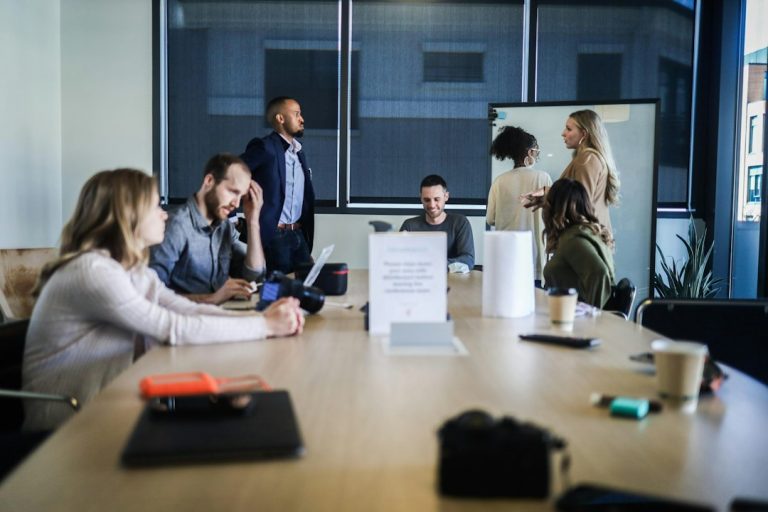 Team discussing options during a decision and recommendation meeting